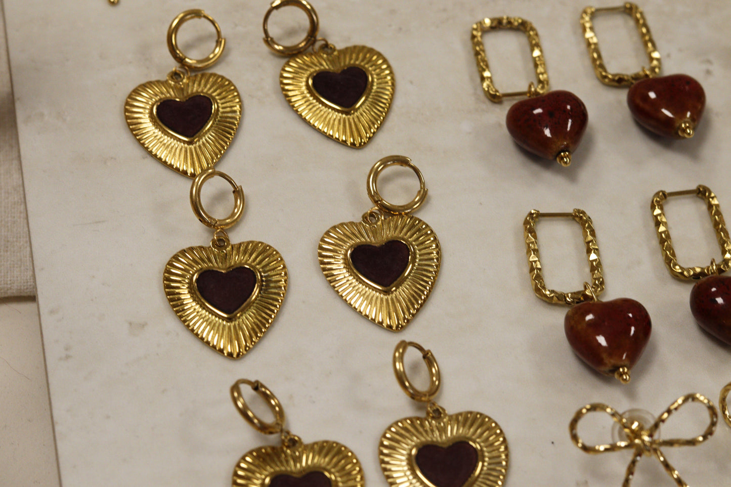 hart oorbel goud bordeaux